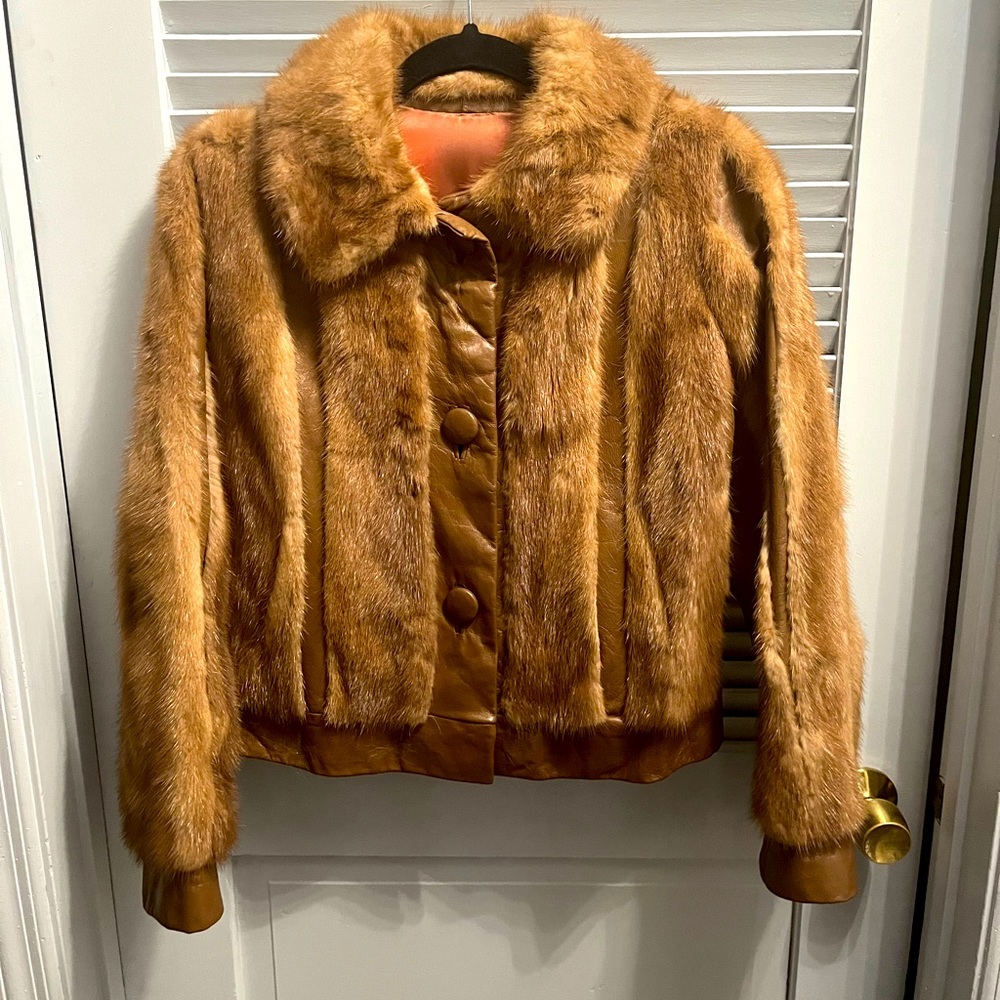 This is a vintage real rabbit fur coat with real leather